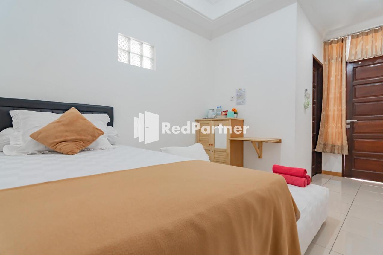 Langkar Guest House Syariah Mitra Reddoorz Samarinda Exterior photo
