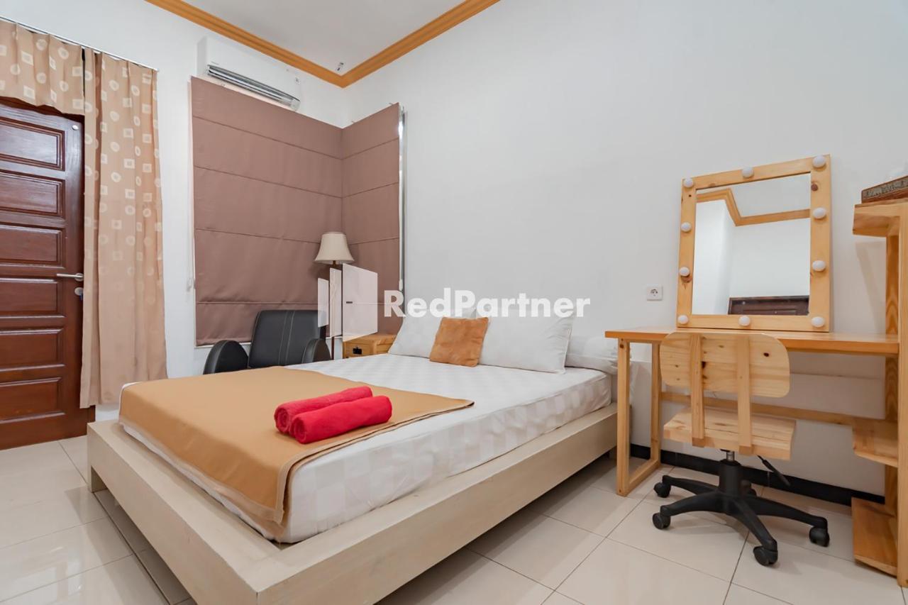 Langkar Guest House Syariah Mitra Reddoorz Samarinda Exterior photo