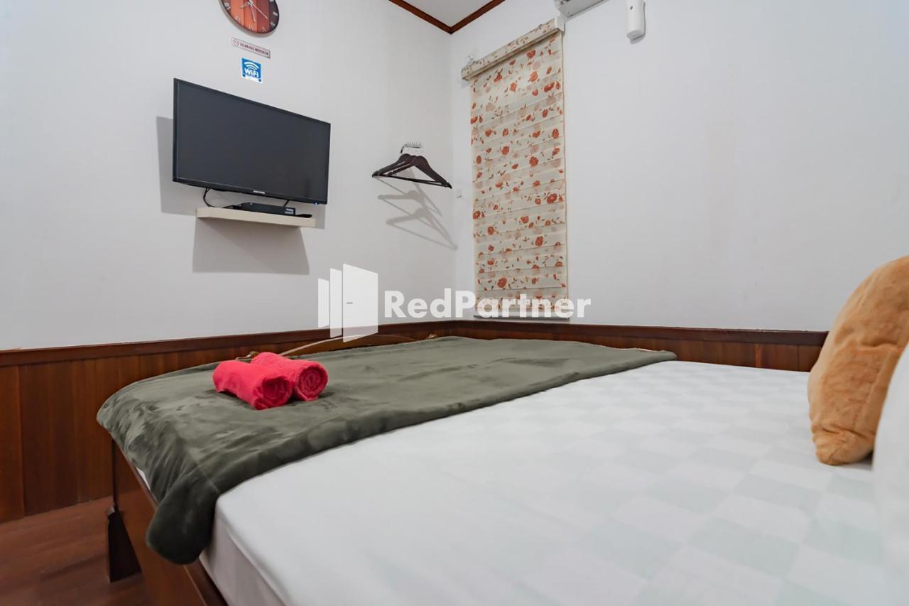 Langkar Guest House Syariah Mitra Reddoorz Samarinda Exterior photo