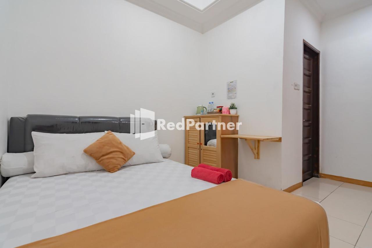 Langkar Guest House Syariah Mitra Reddoorz Samarinda Exterior photo