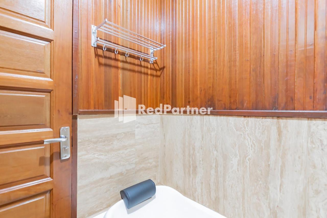 Langkar Guest House Syariah Mitra Reddoorz Samarinda Exterior photo