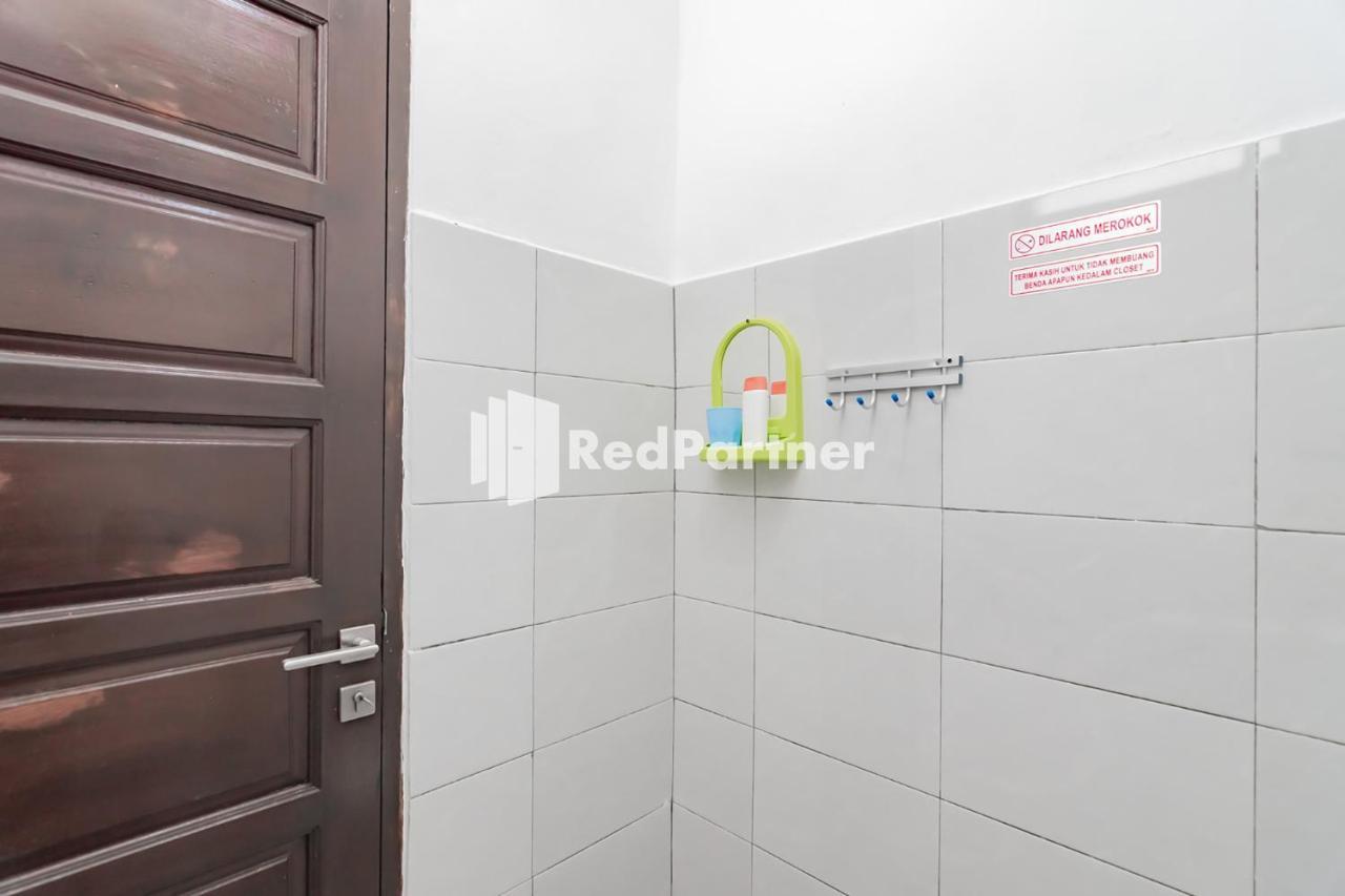 Langkar Guest House Syariah Mitra Reddoorz Samarinda Exterior photo