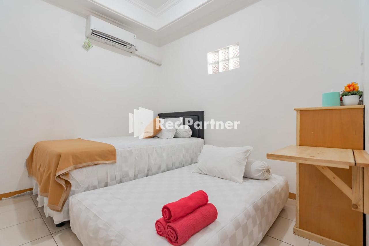 Langkar Guest House Syariah Mitra Reddoorz Samarinda Exterior photo