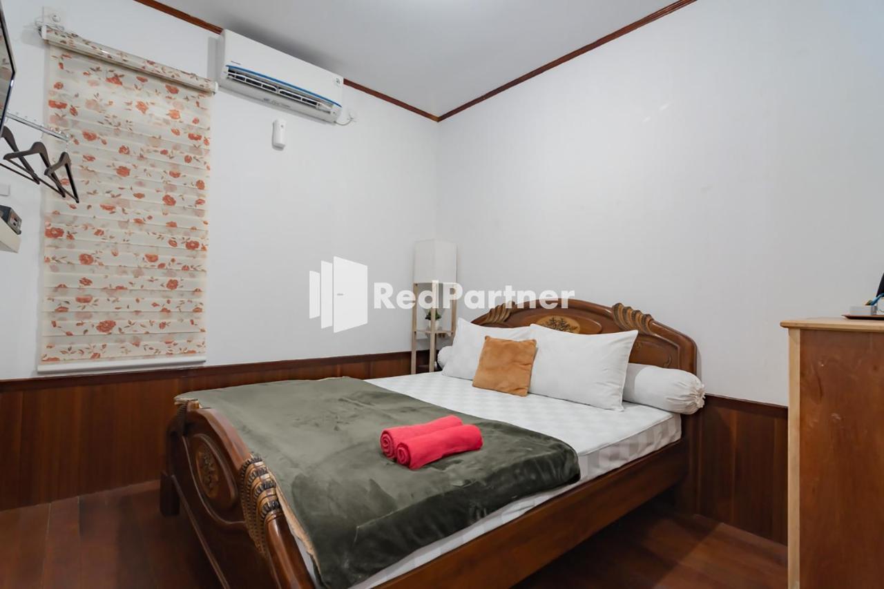 Langkar Guest House Syariah Mitra Reddoorz Samarinda Exterior photo